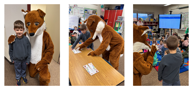Student posing with Fox mascot