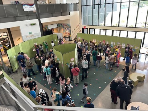 Students looking at displays