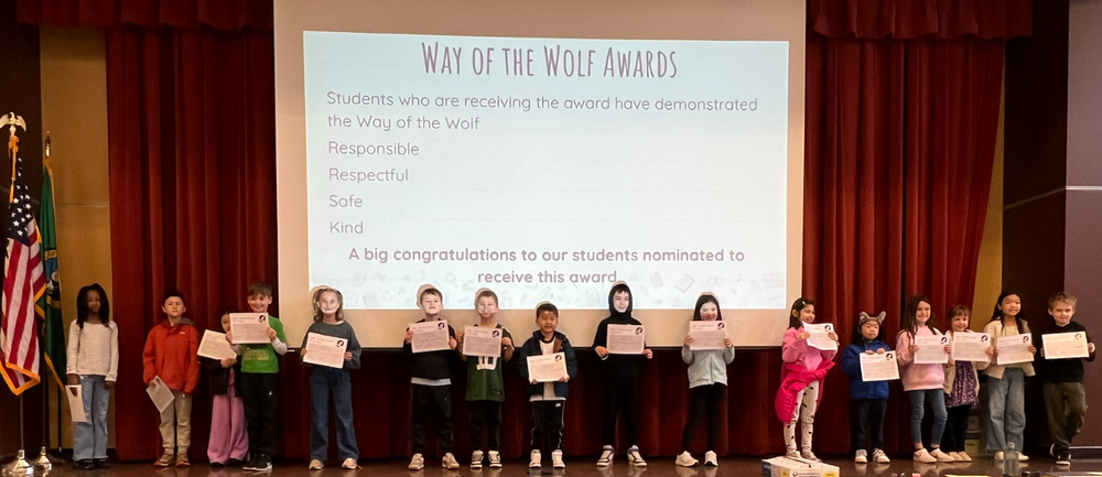 Students holding certificates