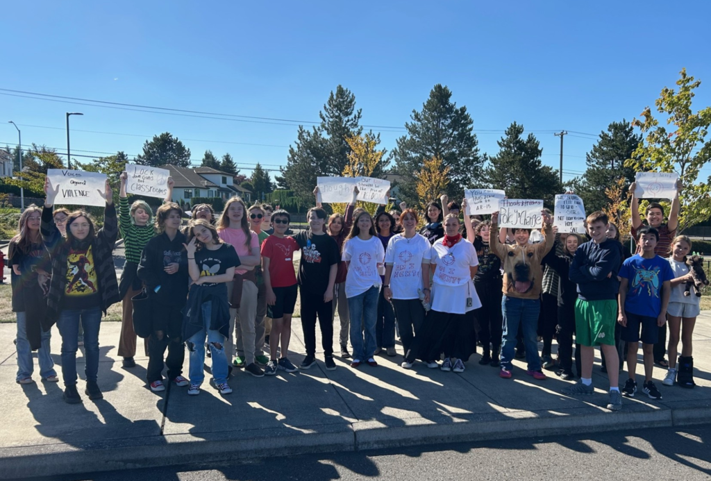 Students protesting and holding signs