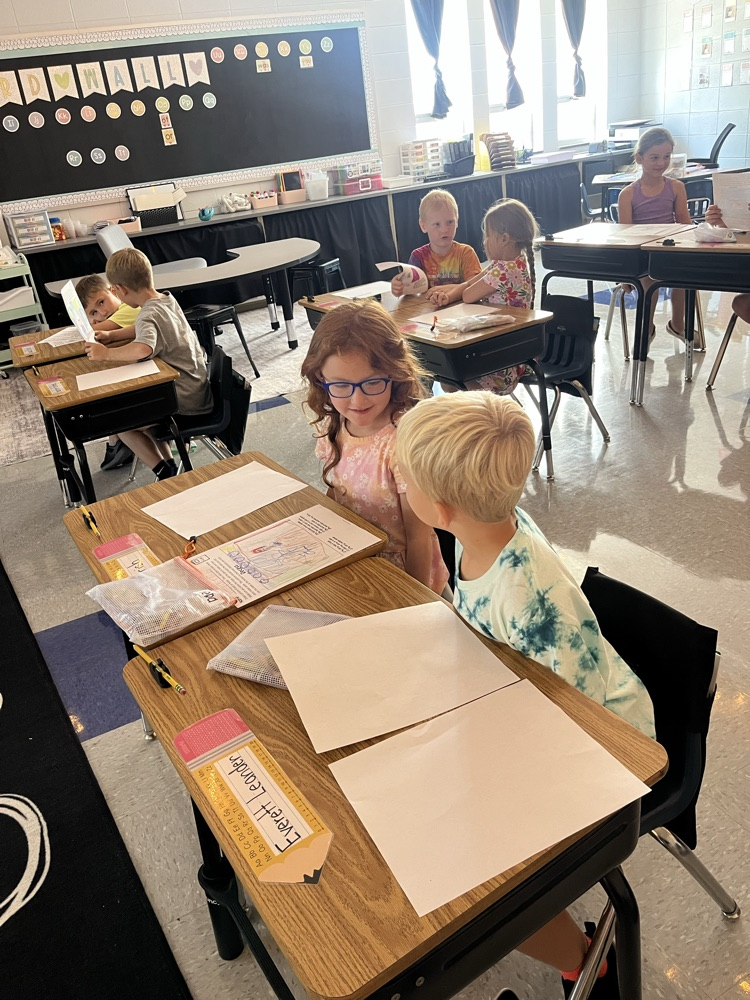 sharing stories of their illustrations 