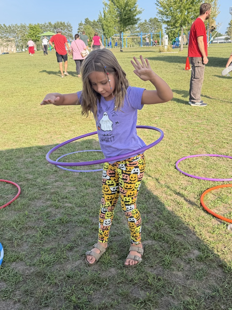 Child hula hooping 