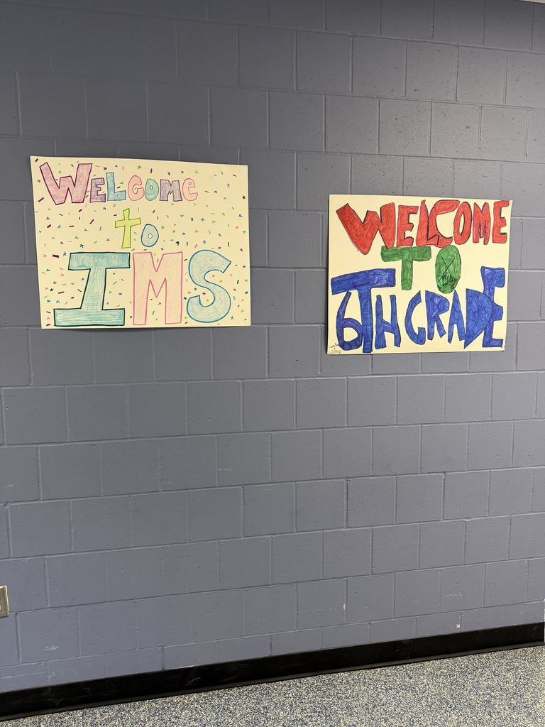 Signs welcoming our 6th grade students to school.