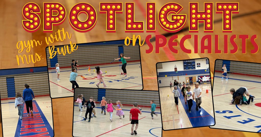 A graphic collage titled "SPOTLIGHT on SPECIALISTS: gym with Mrs. Burk" set against a wooden gymnasium floor background. The image features five photo cutouts showing elementary school students participating in various gym activities, including walking together, running drills, playing with equipment, and interacting with their PE teacher, Mrs. Burk, inside a school gymnasium. I can tailor this post further if you tell me: The name of your school or mascot to tag/mention Specific PE skills or games featured in these photos (e.g., relay races, basketball basics) The tone you prefer (e.g., casual, highly formal, or student-focused)