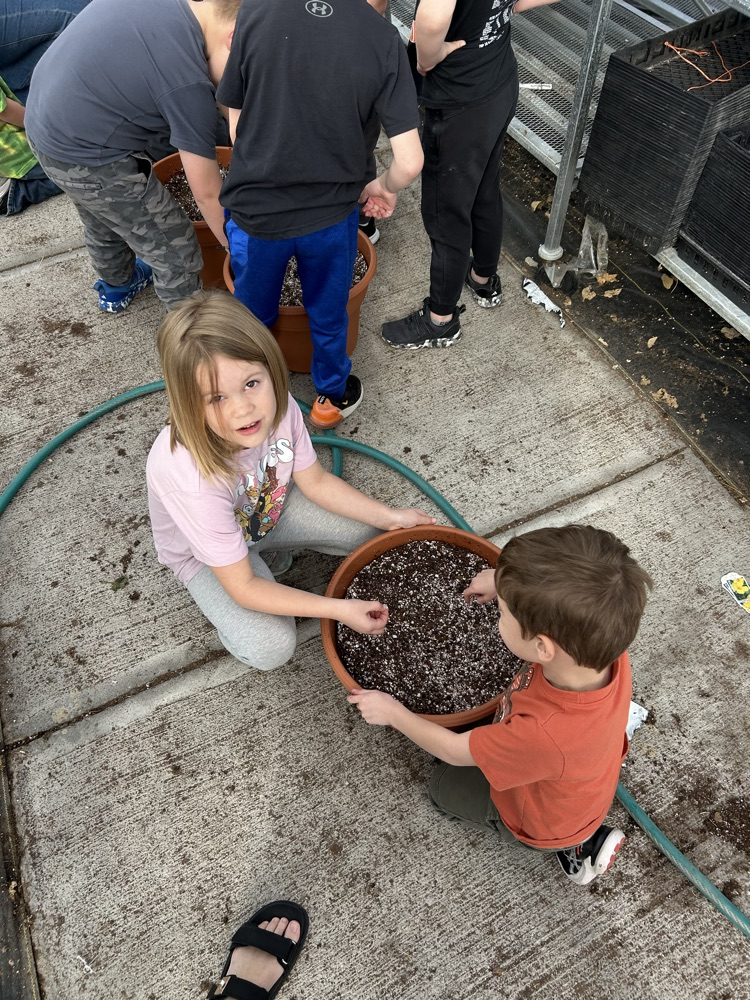 kindergarten helping FFA greenhouse 2026