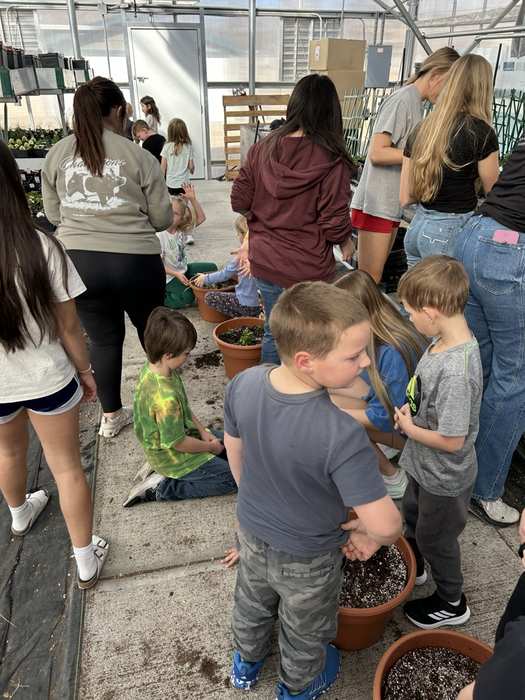 kindergarten helping FFA greenhouse 2026