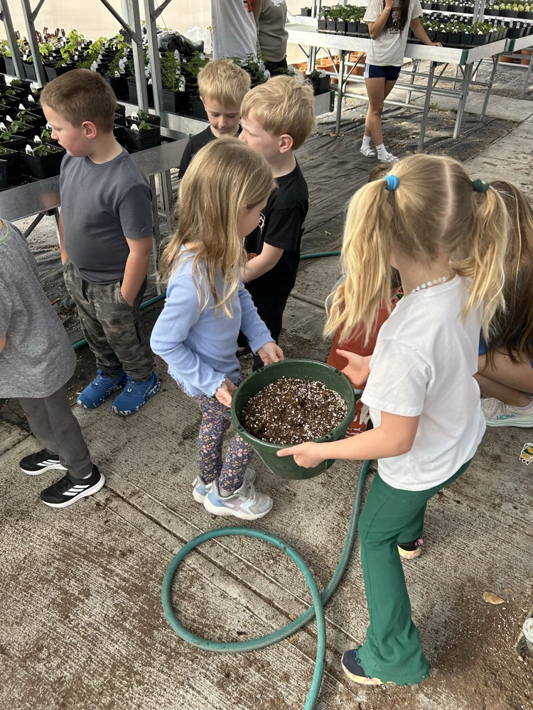 kindergarten helping FFA greenhouse 2026