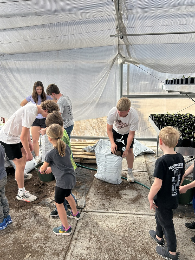 kindergarten helping FFA greenhouse 2026