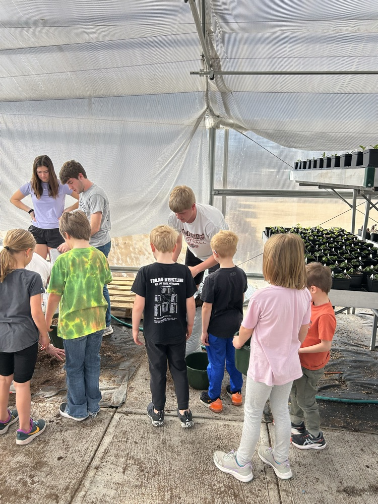 kindergarten helping FFA greenhouse 2026