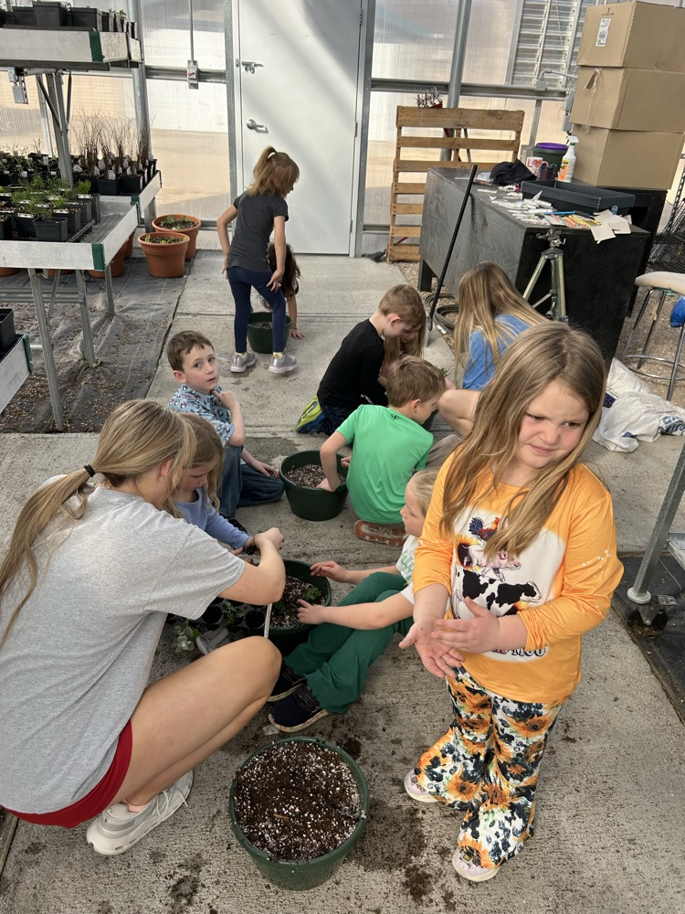kindergarten helping FFA greenhouse 2026