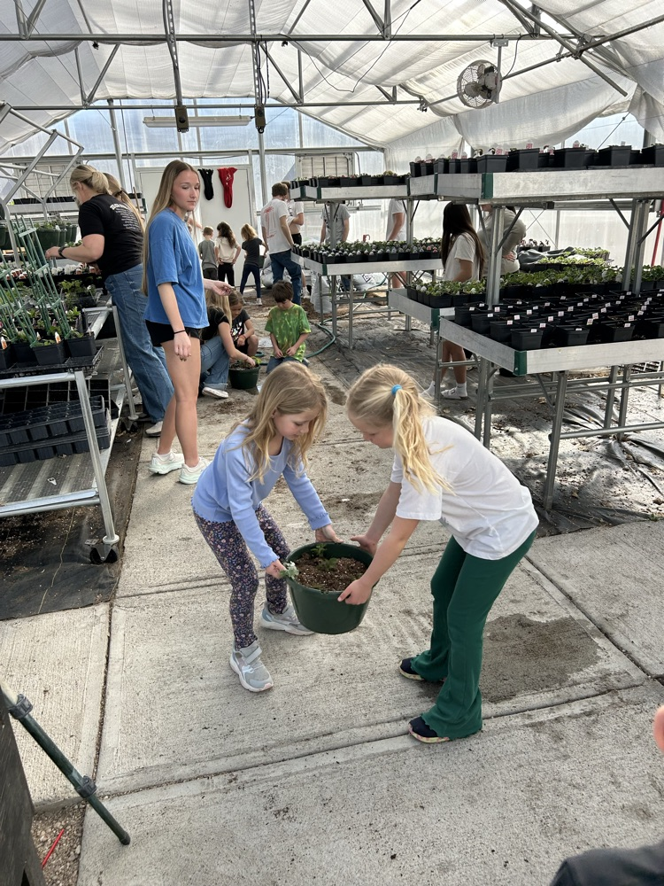 kindergarten helping FFA greenhouse 2026