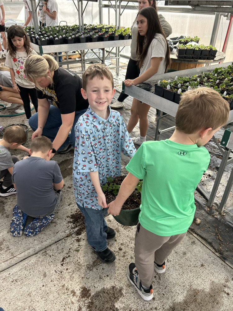 kindergarten helping FFA greenhouse 2026