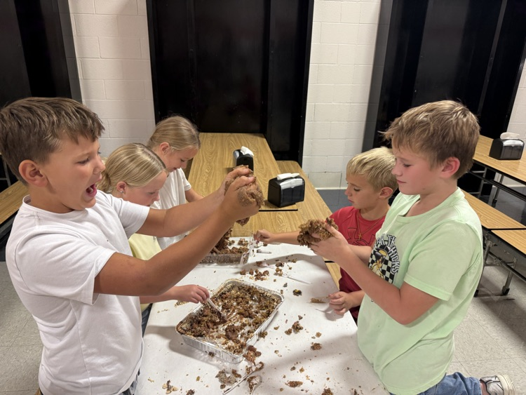 3rd grade getting hands-on with their “fossil” dig