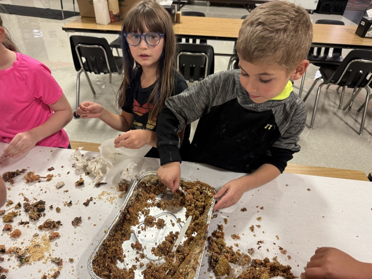 3rd grade getting hands-on with their “fossil” dig