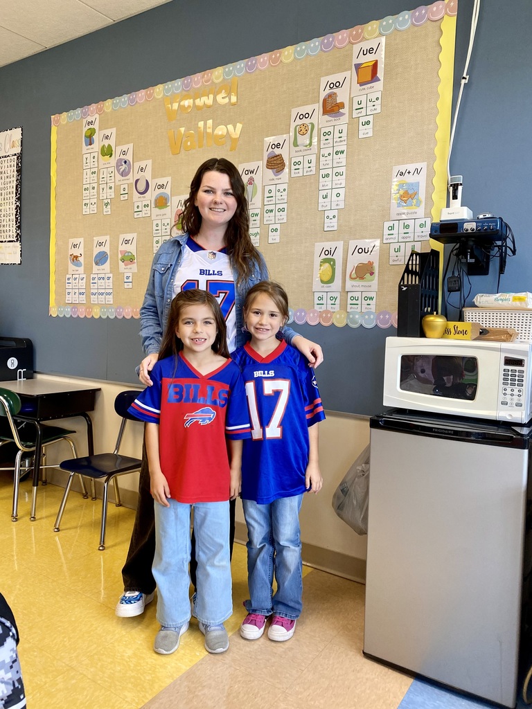 Mara with two students