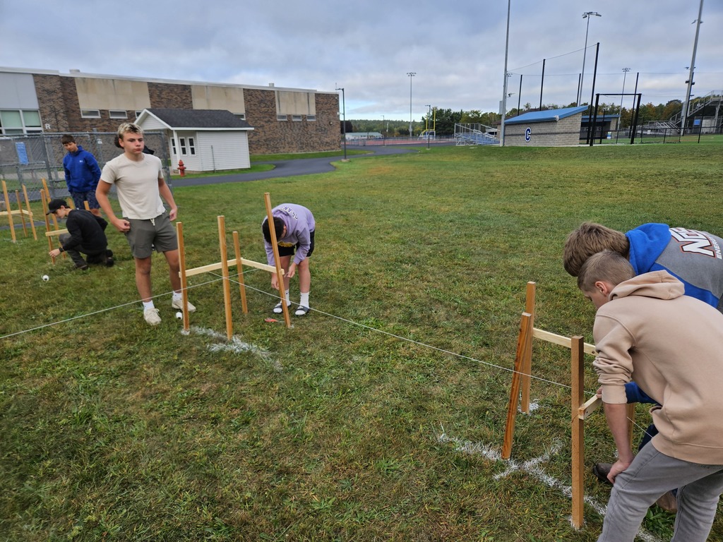 Mr. Petrie's Residential Structures class spent the last 2 weeks learning about plot plans and building lines. Students modeled a building layout using plywood, nails and string, keeping a critical eye on accurate measurements. Later, they got into groups of 4 and applied this knowledge to a full scale site. Groups took time to layout a perfectly square 8' x 12' building. They drove stakes and leveled line just like the professionals in the real world. By the end, students were ready for a (hypothetical) excavator to start digging! 