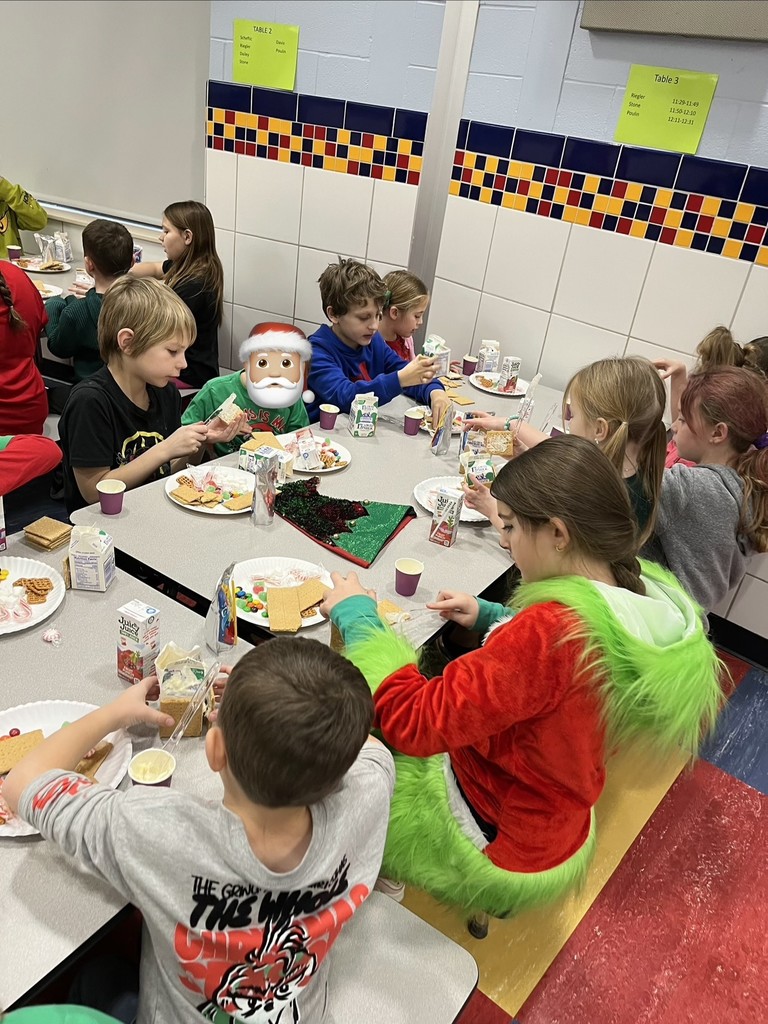 Riegler and Poulin's Classes Making Gingerbread Houses