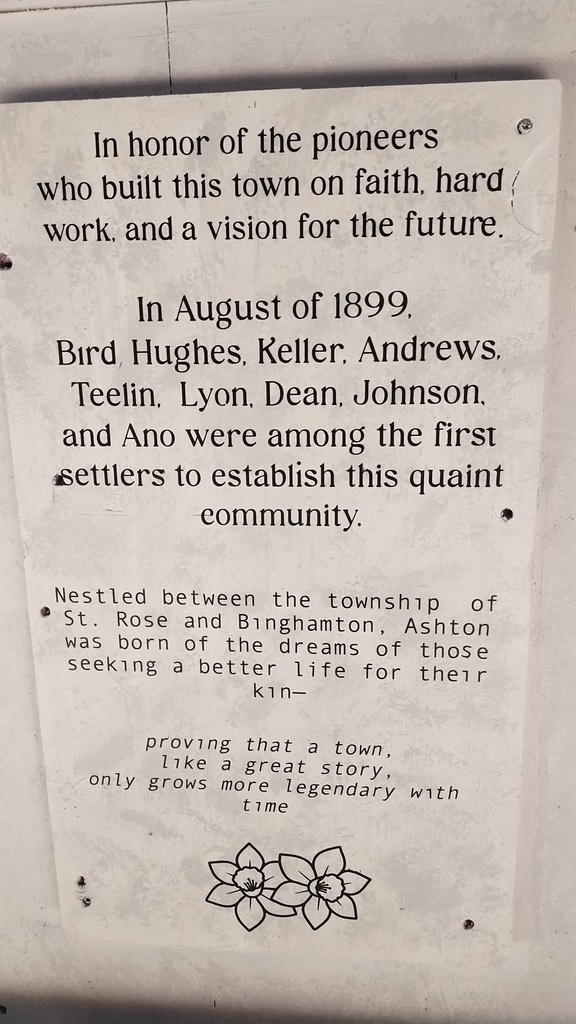 Ashton Monument Inscription which includes the names Hughes, Bird, Keller, Andrews, Teelin, Lyon, Dean, Johnson, and Ano.
