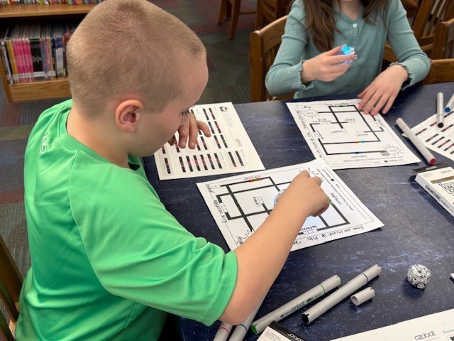 3rd Grade IFA Group at McVille working with Ozobots