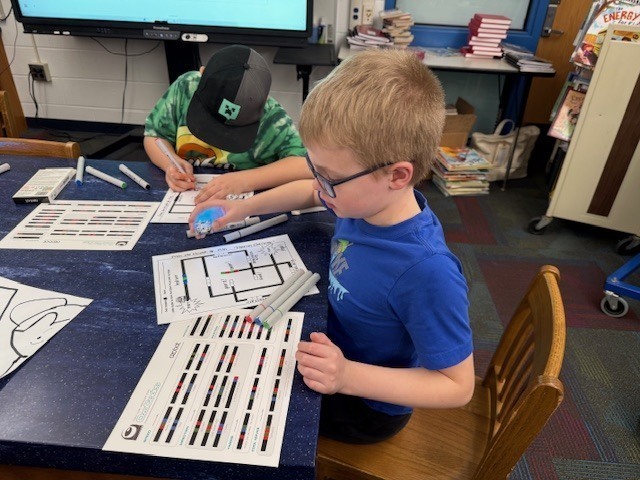 3rd Grade IFA Group at McVille working with Ozobots