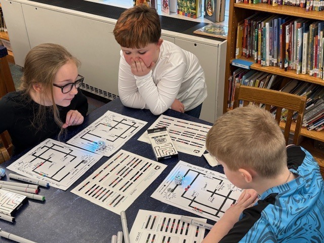 3rd Grade IFA Group at McVille working with Ozobots