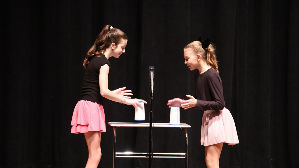 Students Brazlyn Lefler and Tatum Swancott performing the Cup Song from Pitch Perfect