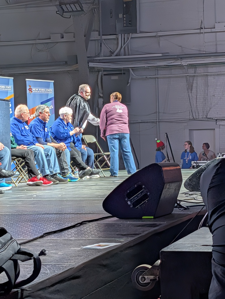 Jessica Receiving Her Award on Stage At the NYS OM Association State Finals