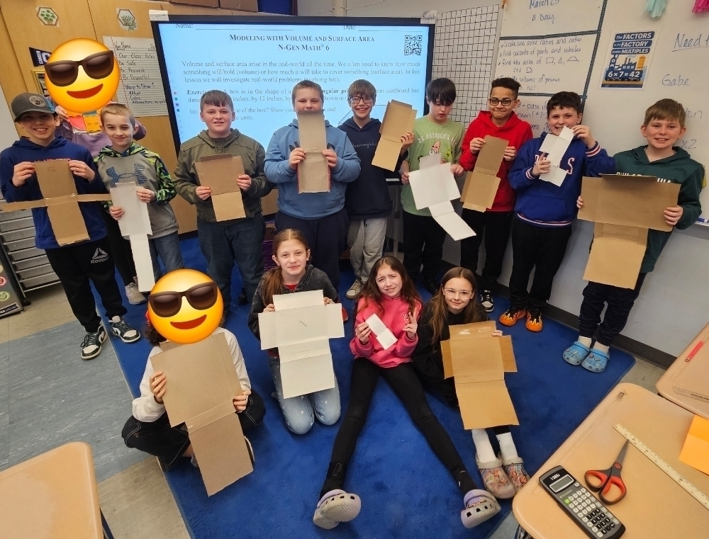 Mrs. Willson's students with unfolded boxes