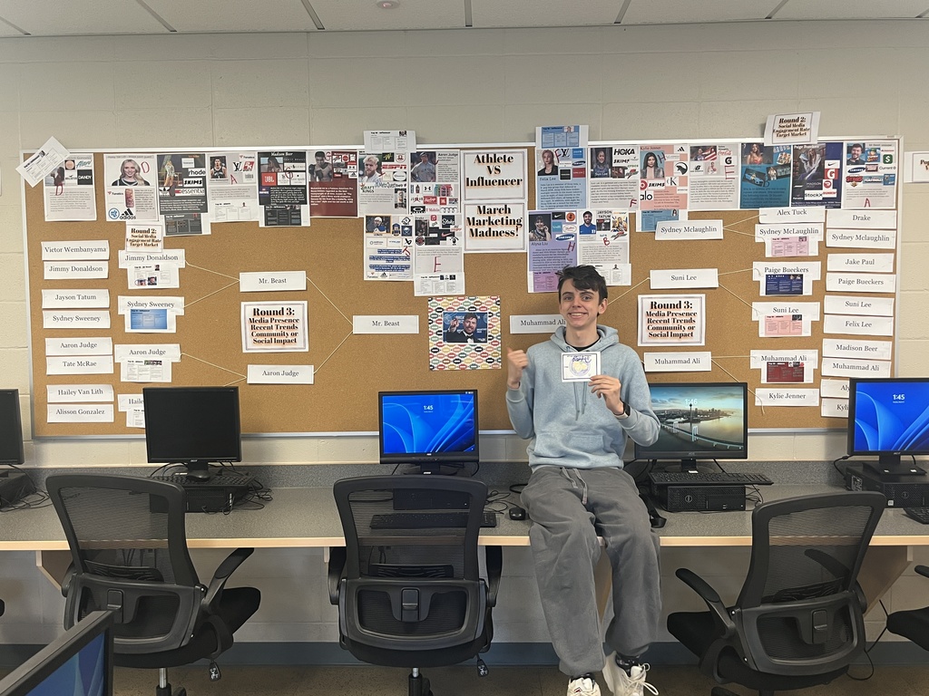 Bart in front of the bracket board with his prize