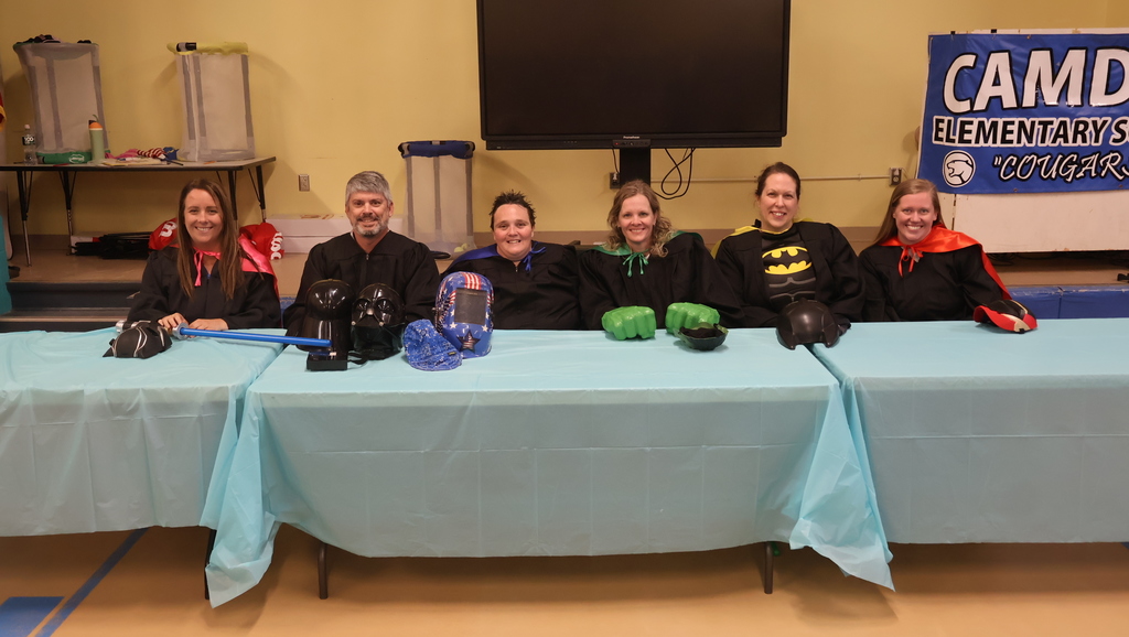 Masked Readers Hulk, Catwoman, Iron Man, Vader, Welder, and. Batman, unmasked!