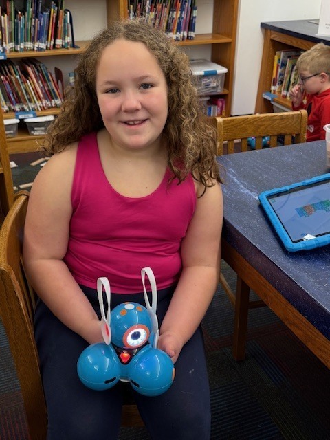 McConnellsville Coding Club Students Working On A Robotics Easter Egg Hunt In The Library
