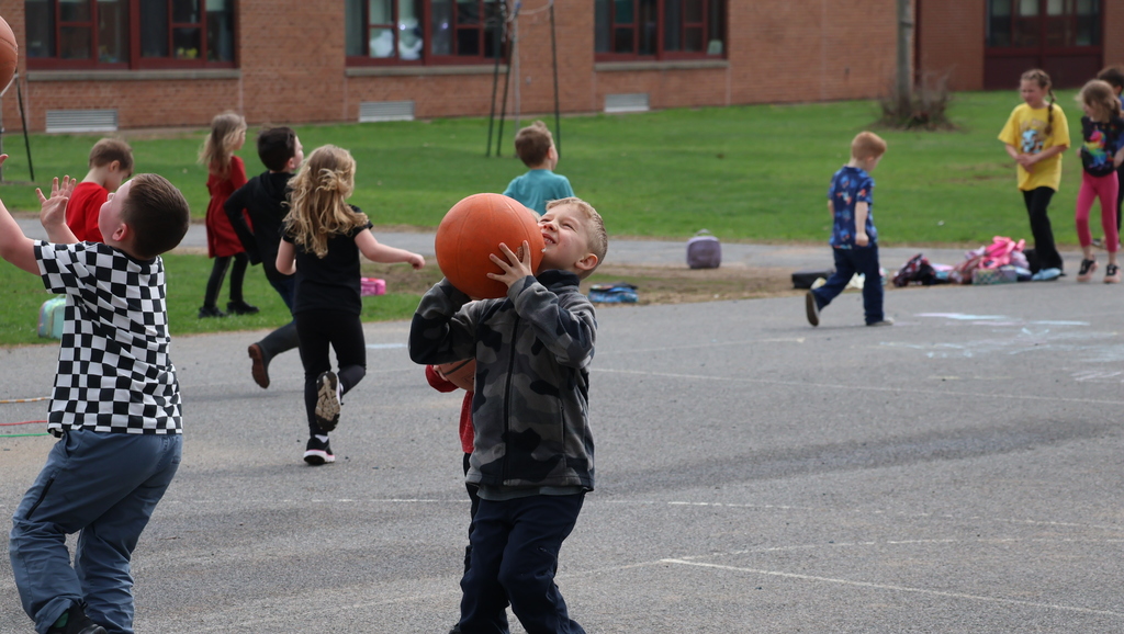 CES Students on Playground During Recess - Shooting Baskets