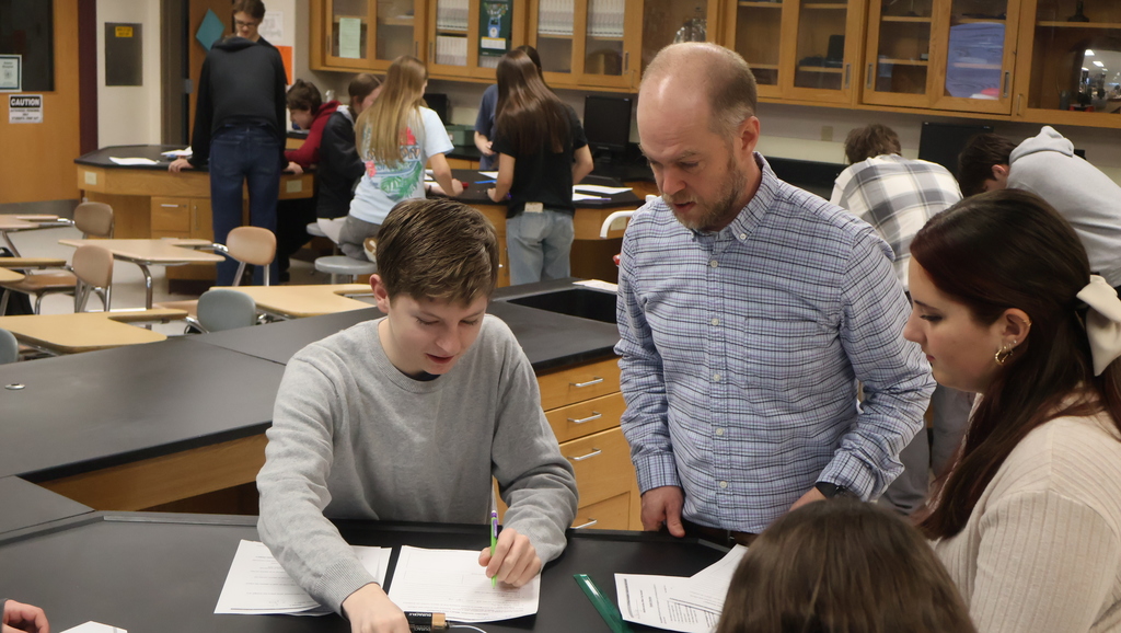 Mr. Scholz's students completing their electromagnetic lab in physics class