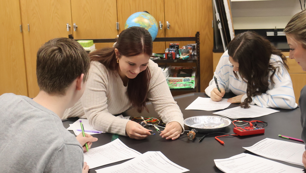 Mr. Scholz's students completing their electromagnetic lab in physics class