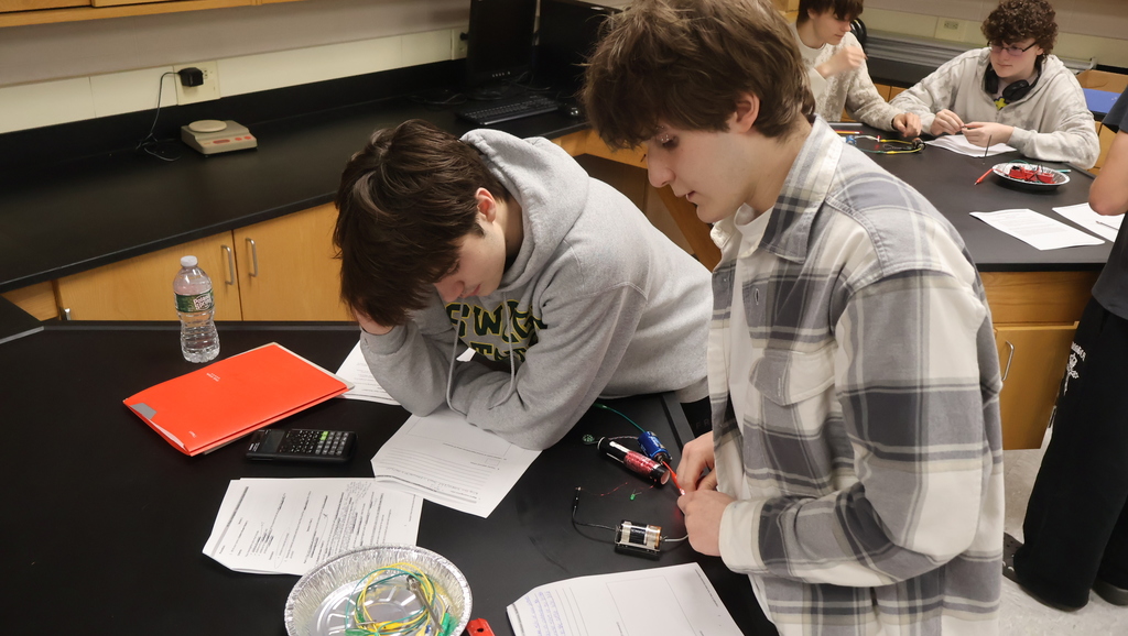 Mr. Scholz's students completing their electromagnetic lab in physics class
