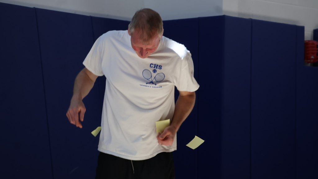 Staff Members Attempting To Shake Off Sticky Notes