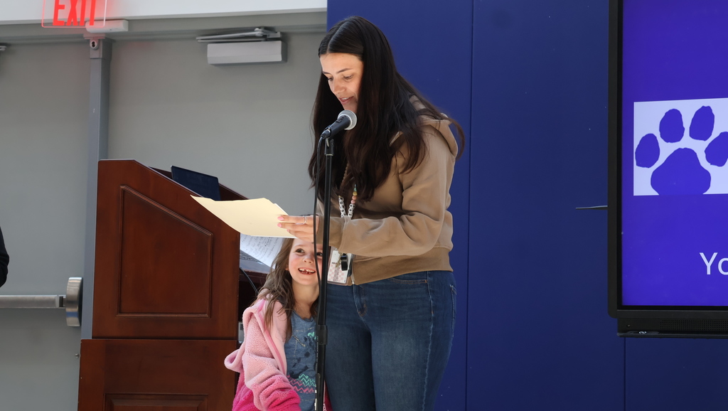 Student Receiving a Character Award Certificate