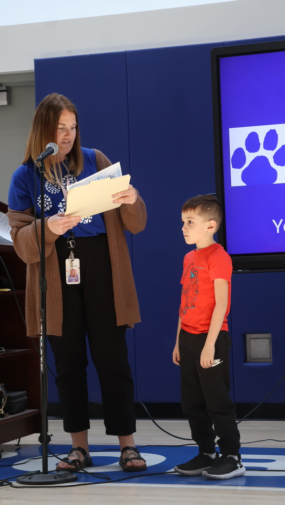 Student Receiving His Character Award Certificate