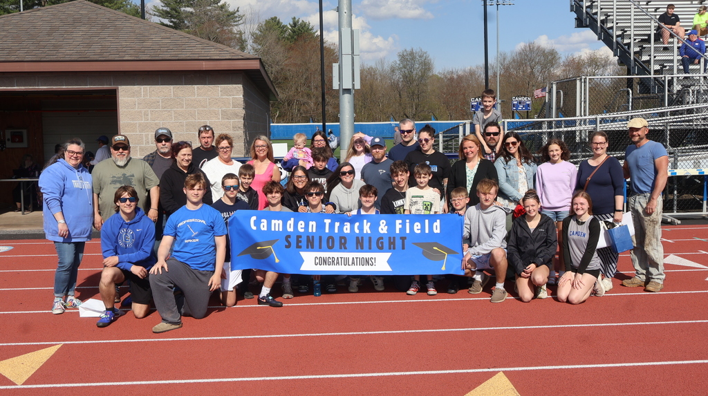 Group photo of senior student-athletes with families