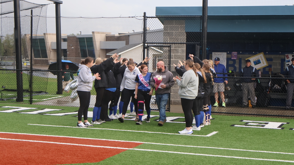 Abigail and Family Walking Through Teammates