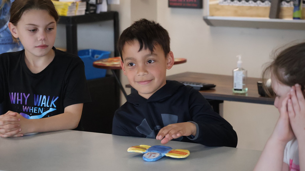 Second Grade Student with His Sculpture