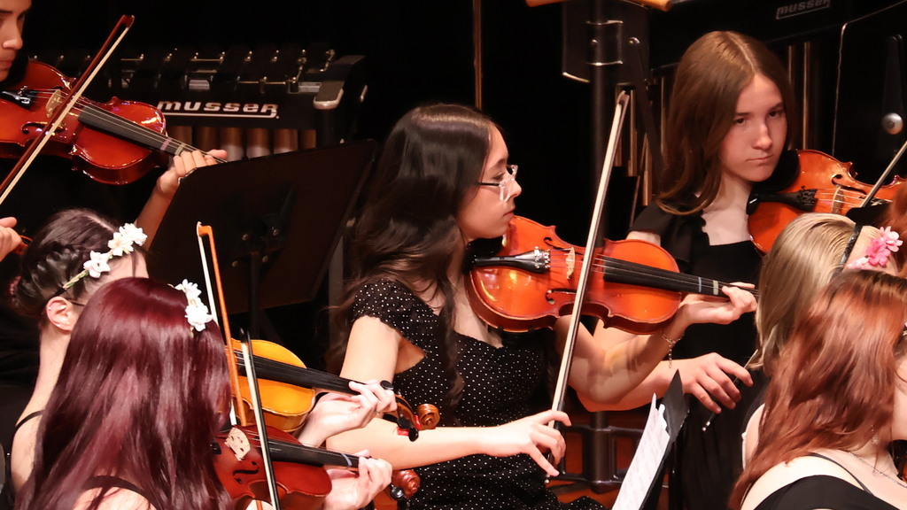 The violin section from the CHS Orchestra
