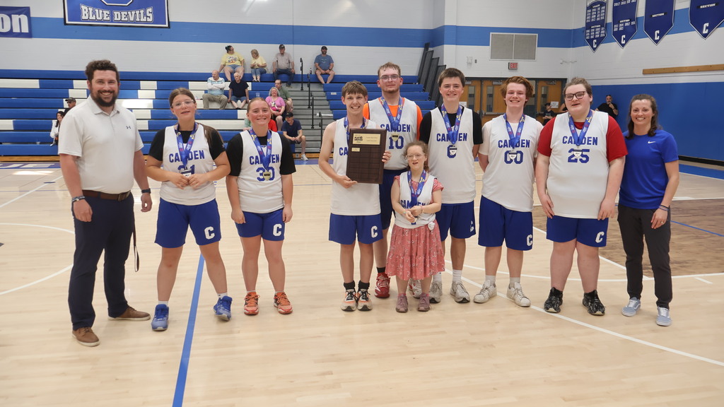 Camden Unified Basketball Team with Medals and Plaque