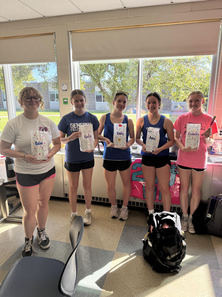 Izzy Johnson Anna Gilsenan Emily Gilsenan Kaela Skinner HaLei Barrett holding their goodie bags
