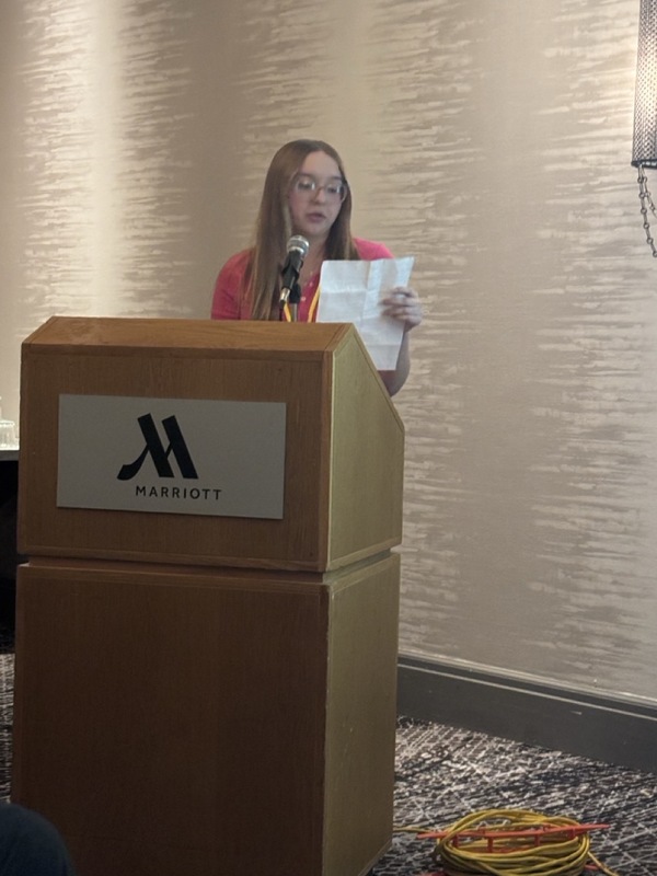 Brooklyn Waterman at the podium