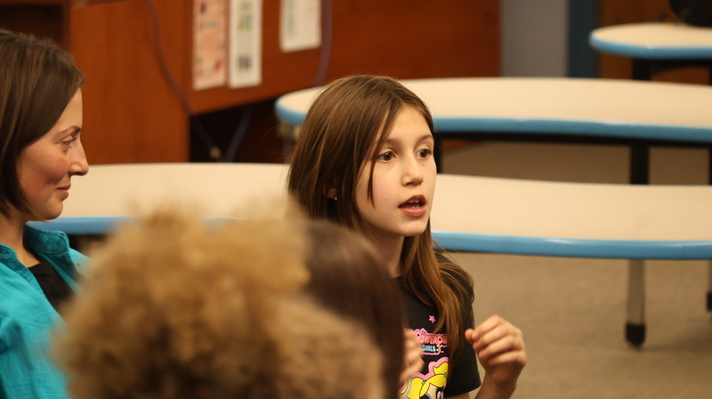 Student Asking Questions at Megan E Freeman's Speaking Engagement