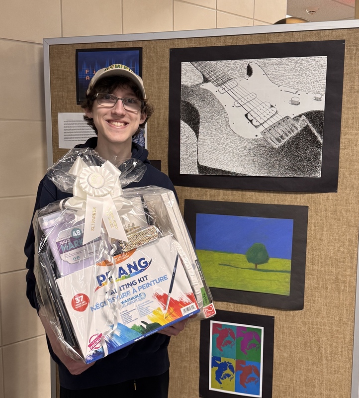 Fischer with his prize and winning work