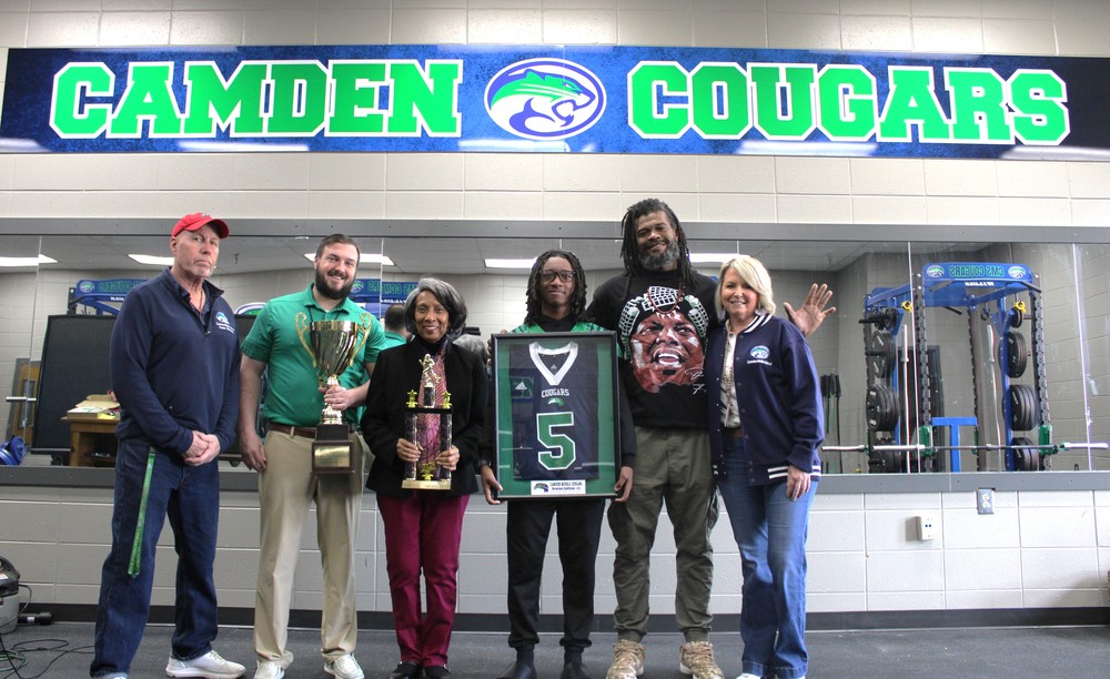 Braxton Sullivan Award winner Tylan Hamilton pictured with Braxton's Aunt, Sylvia Sullivan-Williams, Principal Dr. Roberts, Brian Crum, Zack Marx and John Grimesey. 