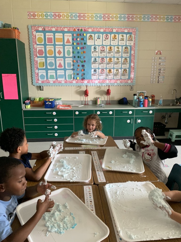 students write using shaving cream