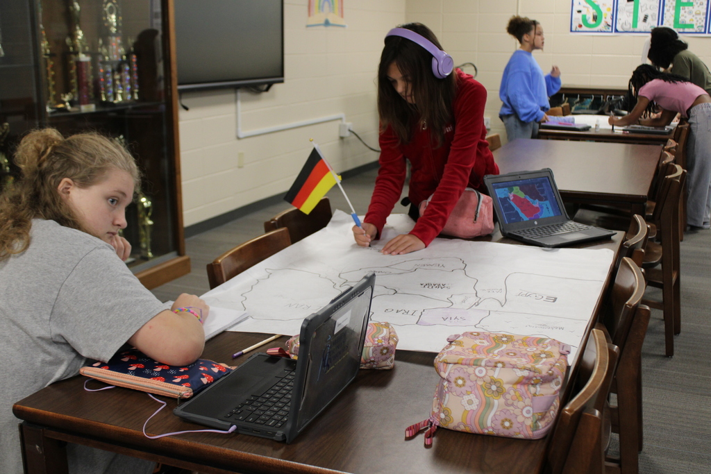 kids working on map project